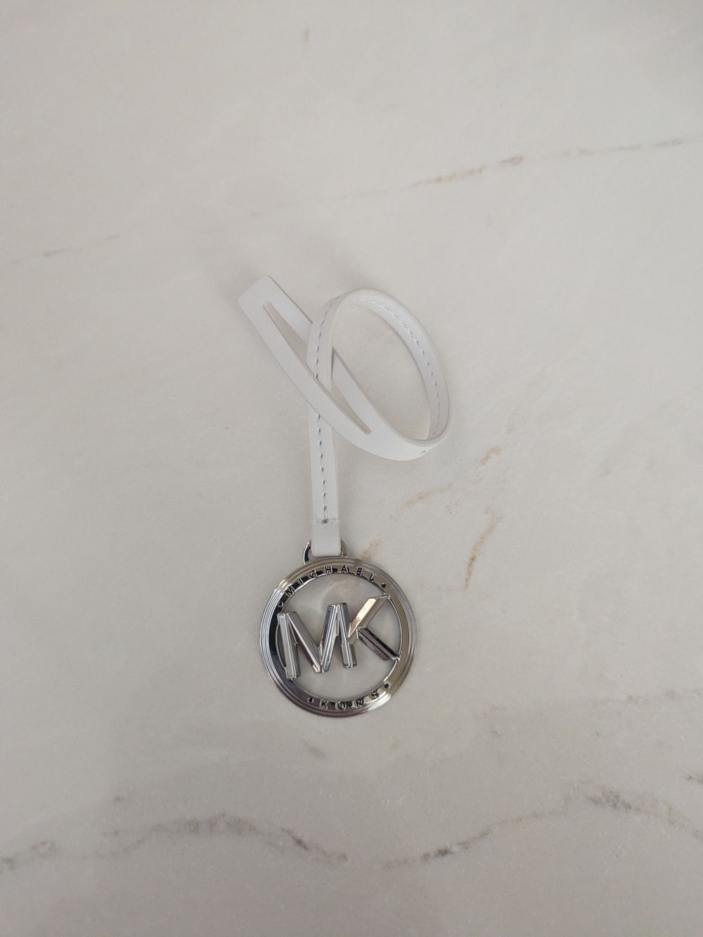 Michael Kors White Leather Tag with Silver MK Medallion
